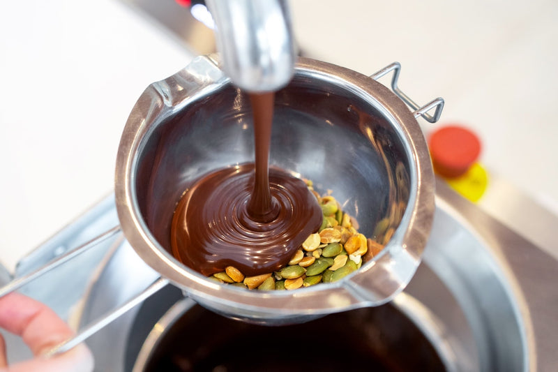 You will get 100 gram of Dark Chocolate or Milk Chocolate, 1 cup of filling, 2 kind of toppings, and the final chocolate (bark chocolate, no mold)!